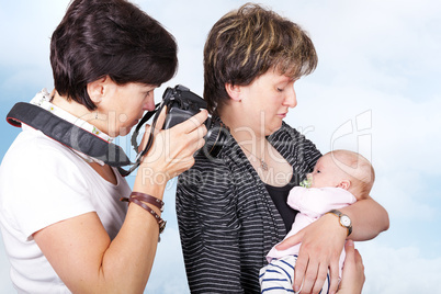 Woman photographed baby in her arms Mother