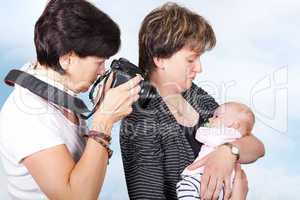 Woman photographed baby in her arms Mother