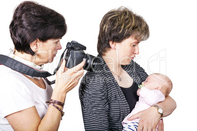 Woman photographed baby in her arms Mother