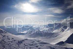 Snowy mountains in evening