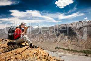 Photographer on the high mountain