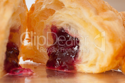 croissant French brioche filled with berries jam