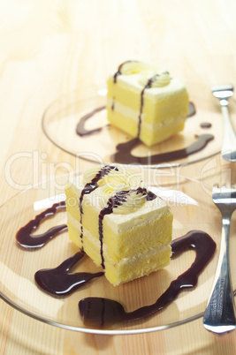 fresh cream cake closeup with chocolate sauce