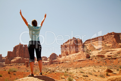 Woman with raised hands