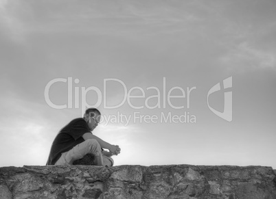 Young man sittting outdoors