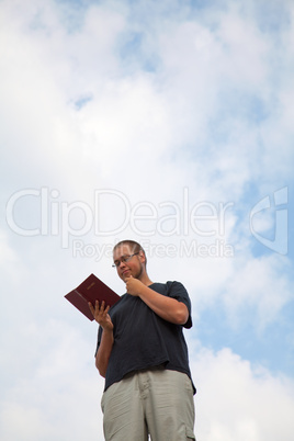 Young man staying with the Bible