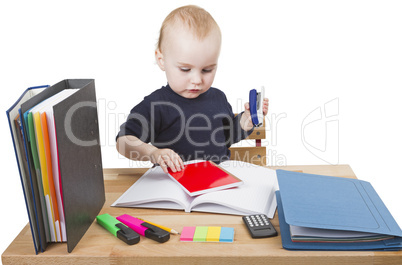 young child at writing desk