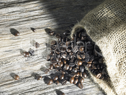 coffee beans on weathered wood