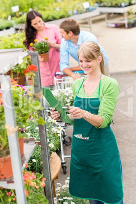 Florist at garden center retail inventory