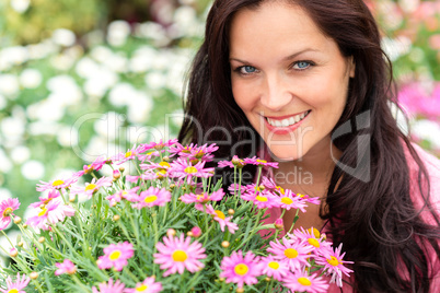 Portrait of beautiful woman with purple flowers