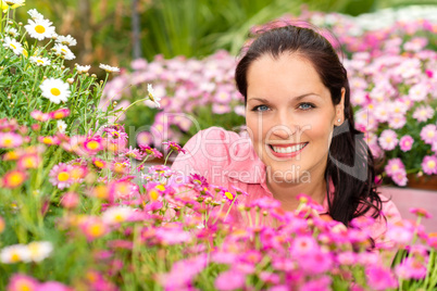 Portrait beautiful woman with pink daisy flowers