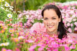 Portrait beautiful woman with pink daisy flowers