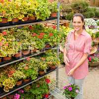 Garden centre woman shopping plants