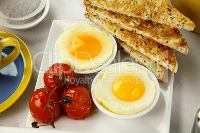 Poached Eggs And Tomatoes