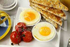 Poached Eggs And Tomatoes