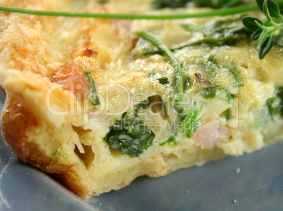 Slice Of Spinach And Bacon Quiche