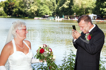 His bride, groom, photograph