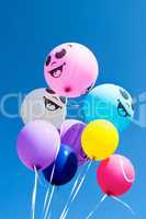 Balloons against blue sky
