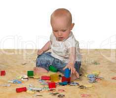 Young baby playing with educational toys
