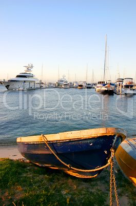 Blue Dinghy And Yachts