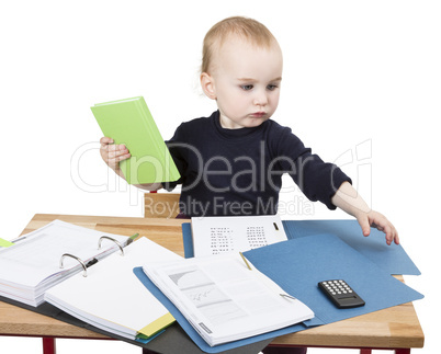 young child at writing desk