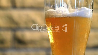 Pouring beer into a glass