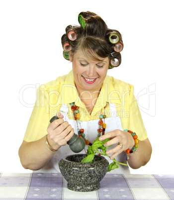 Housewife Crushing Herbs