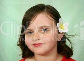 Little Girl With Flower In Her Hair