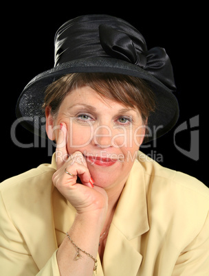 Thoughtful Woman In Hat