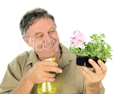 Nurseryman Sprays Seedlings