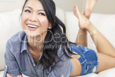 Beautiful Sexy Chinese Oriental Asian Woman Smiling in Shorts