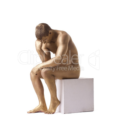 Strong man posing nude studio portrait