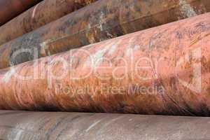 Group of old rusty metal pipes