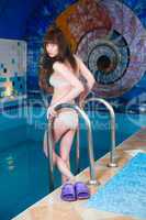 Attractive girl in swimming pool