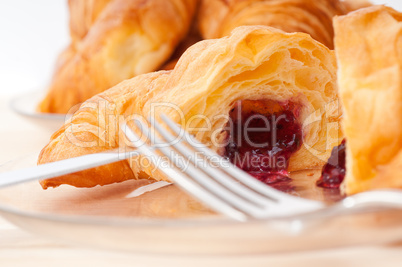 croissant French brioche filled with berries jam