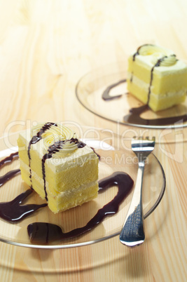 fresh cream cake closeup with chocolate sauce