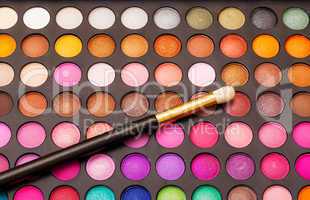 Set of Multicolored Eyeshadows with Brush