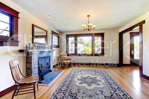 Empty room with fireplace in an old nice house.