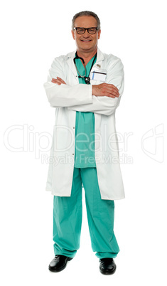 Medical expert standing with arms crossed