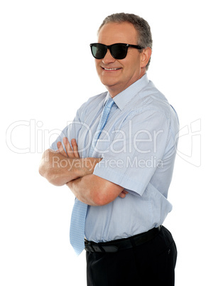 Confident male executive wearing sunglasses