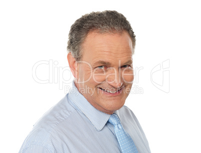 Closeup portrait of smiling senior male executive