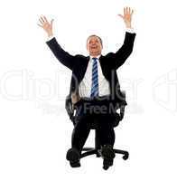 Excited businessman celebrating his success