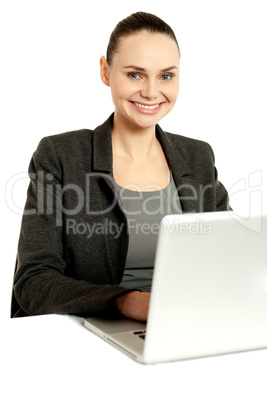 Business professional operating laptop