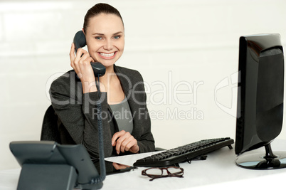 Cheerful secretary advising her client