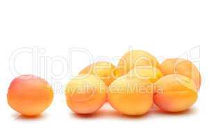 Juicy apricots on a white background