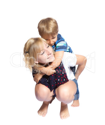 Sister and brother hugging each other