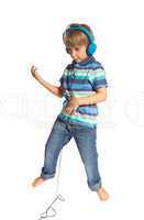 boy playing air guitar and dancing