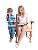 Young woman and boy reading a book. Isolate on white background