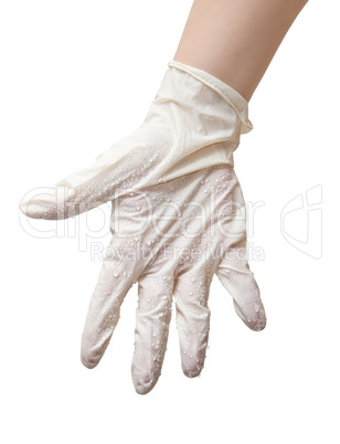 Hands of a doctor in a sterile gloves and drops of water