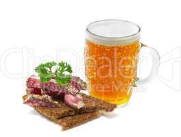 mug of beer and salami with parsley on a white background